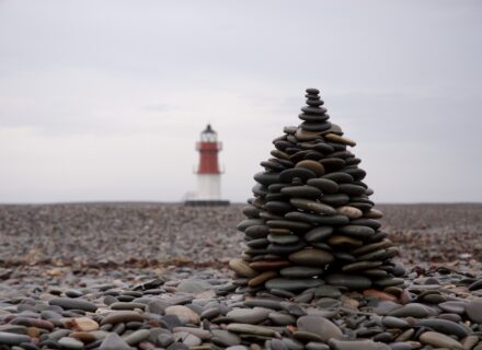 Lighthouse and pebble tower